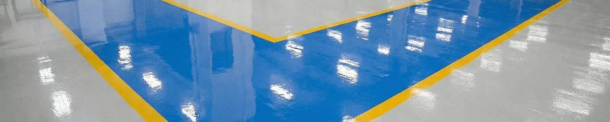 A factory floor professionally covered and marked with epoxy flooring in Chicago, IL